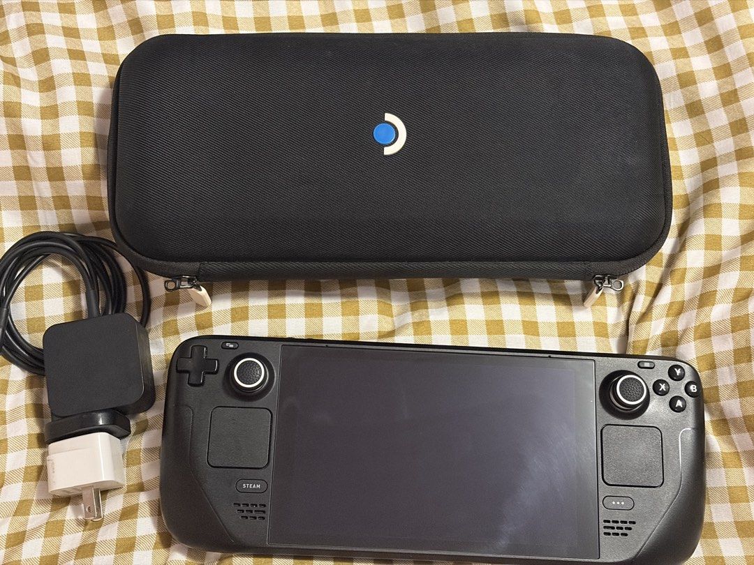 STEAM DECK 256gb LCD (Category: Others) located in Cavite. Submitted by anya16 (Listing ID 1465285842, Image 3). Description: 🎮 STEAM DECK 256GB — FOR SALE! ✨ Pristine condition 🔋 97% Battery Health 🎒 Case included 🎮 Steam Deck unit 🔌 Charger + adaptor 📍 Cavite 🏷️ ₱20,000 — negotiable.