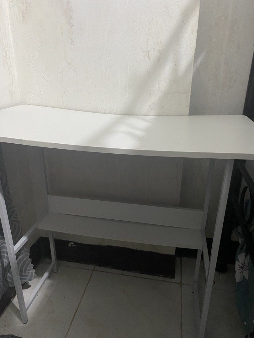 Study Table (Category: Office Furniture & Fixtures) located in Manila. Submitted by dani.anne (Listing ID 1465190190, Image 2). Description: FS STUDY TABLE Set for 600 (nego if sure buyer!) - originally bought these two for 1.3k - Two 80x40cm table - one with shelf, one without - minor issues but still useable! 📍Lacson Street (Near UST) Comment and I’ll dm u for more deets!.