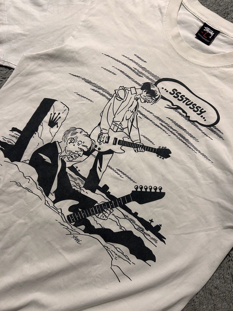 Stussy x Jaime Hernandez Red Tag (Category: Tshirts & Polo Shirts ) located in Lapu Lapu. Submitted by teriyakiboi6021 (Listing ID 1465278899, Image 3). Description: Stussy Red Tag Zombie Large Bootleg Very Good Condition Dimes: Flaws: Minimal stains, 1 tiny pinhole sa print CR: 9/10 DM to purchase📲.