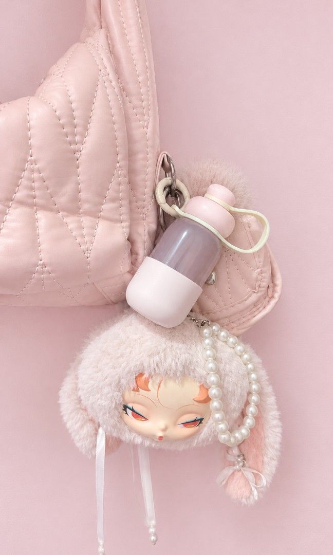 Sunnies Flask Squeezy Pod (Category: Water Bottles & Tumblers) located in Manila. Submitted by fastdragon-916d (Listing ID 1465048730, Image 2). Description: - Brand: Sunnies Studios - Model: Squeezy Pod Flask - Color: Pink with translucent body and solid pink base boot - Features: Attached matching strap and carabiner clip ring on the cap - Condition: Brand new, tag still on (Fresh drop).
