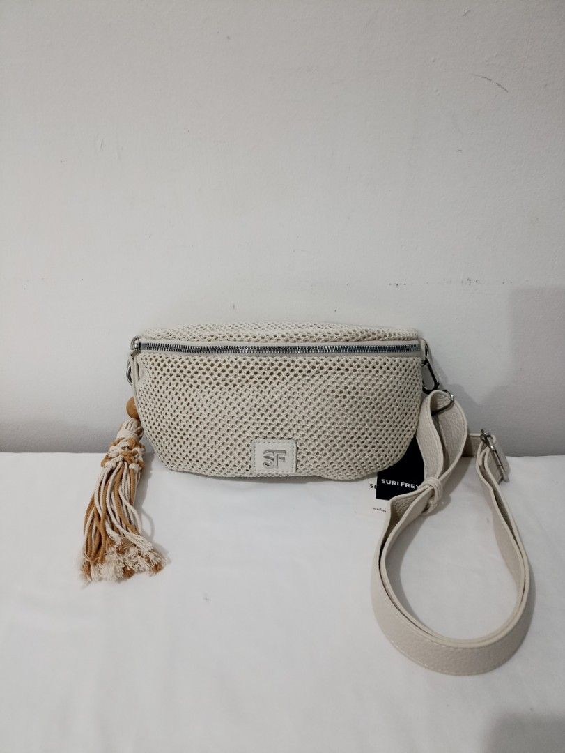 Suri Frey BeltBag Crossbody (Category: Cross-body Bags) located in Kabacan. Submitted by prelovedbags.ph (Listing ID 1465232562, Image 1). Description: Bnew. Mesh and leather combination. With bag charm.