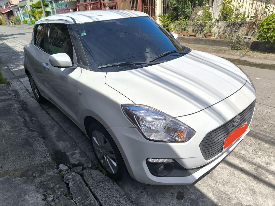 Suzuki Swift 1.2 (M) (Category: Used Cars) located in Caloocan City. Submitted by royalshark_7ebd5d (Listing ID 1465312868, Image 1). Description: For sale: 2019 Suzuki Swift M/T (Hatchback) with current mileage of 53,606km as of Oct. 1 2026. In good condition, no accident history, smooth clutch and transmission. With complete LTO papers and updated registration. Fuel‑efficient, and perfect for both city driving and road trips. You may schedule a