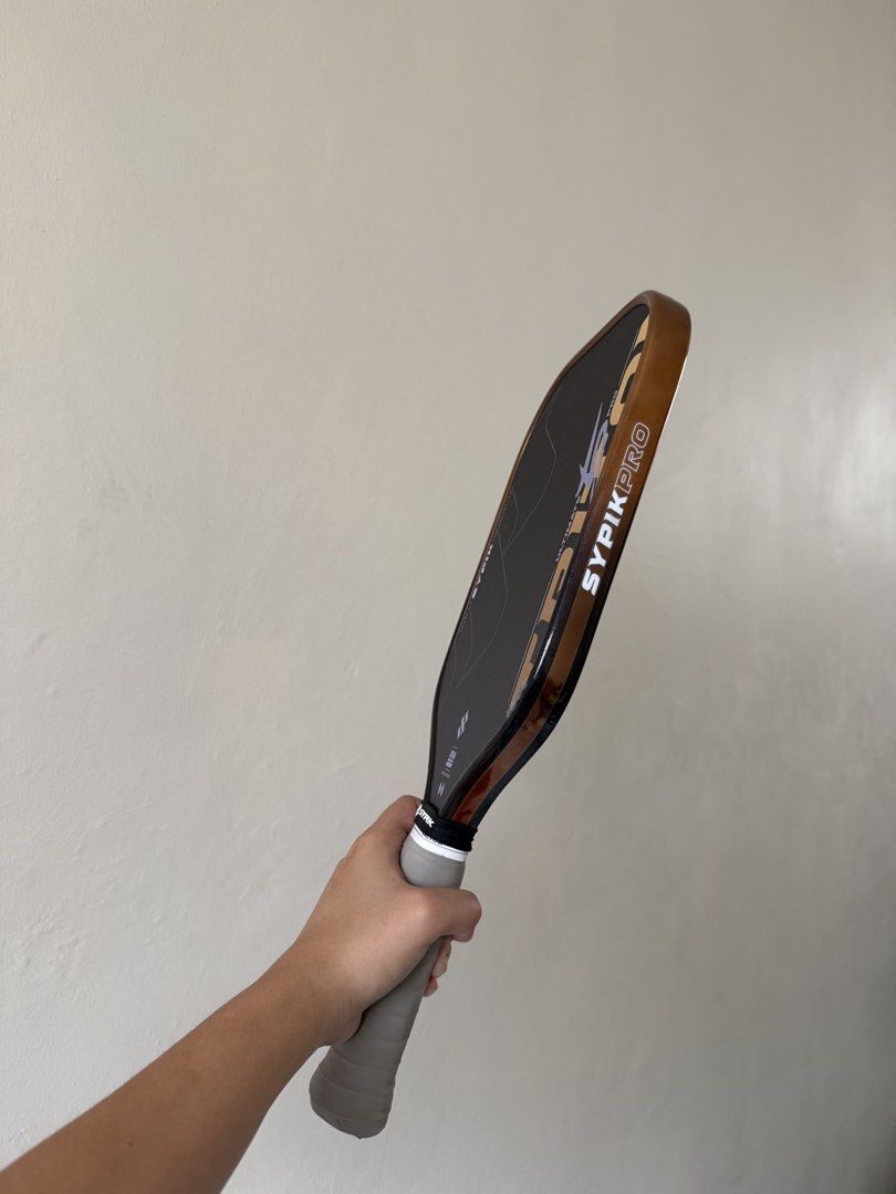 Sypik Triton 5 Ultimate Pro (Category: Racket and Ball Sports) located in Rizal. Submitted by jbddelacruz (Listing ID 1465319541, Image 3). Description: BRONZE HAZE NO ISSUES PRISTINE CONDITION 3 weeks old With ppf edge guard and over grip since day 1 Nfc scannable (warranty not yet activated).