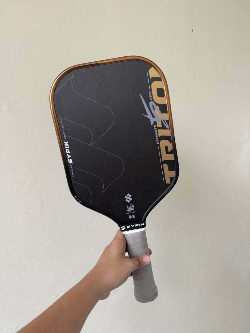Sypik Triton 5 Ultimate Pro (Category: Racket and Ball Sports) located in Rizal. Submitted by jbddelacruz (Listing ID 1465319541, Image 1). Description: BRONZE HAZE NO ISSUES PRISTINE CONDITION 3 weeks old With ppf edge guard and over grip since day 1 Nfc scannable (warranty not yet activated).