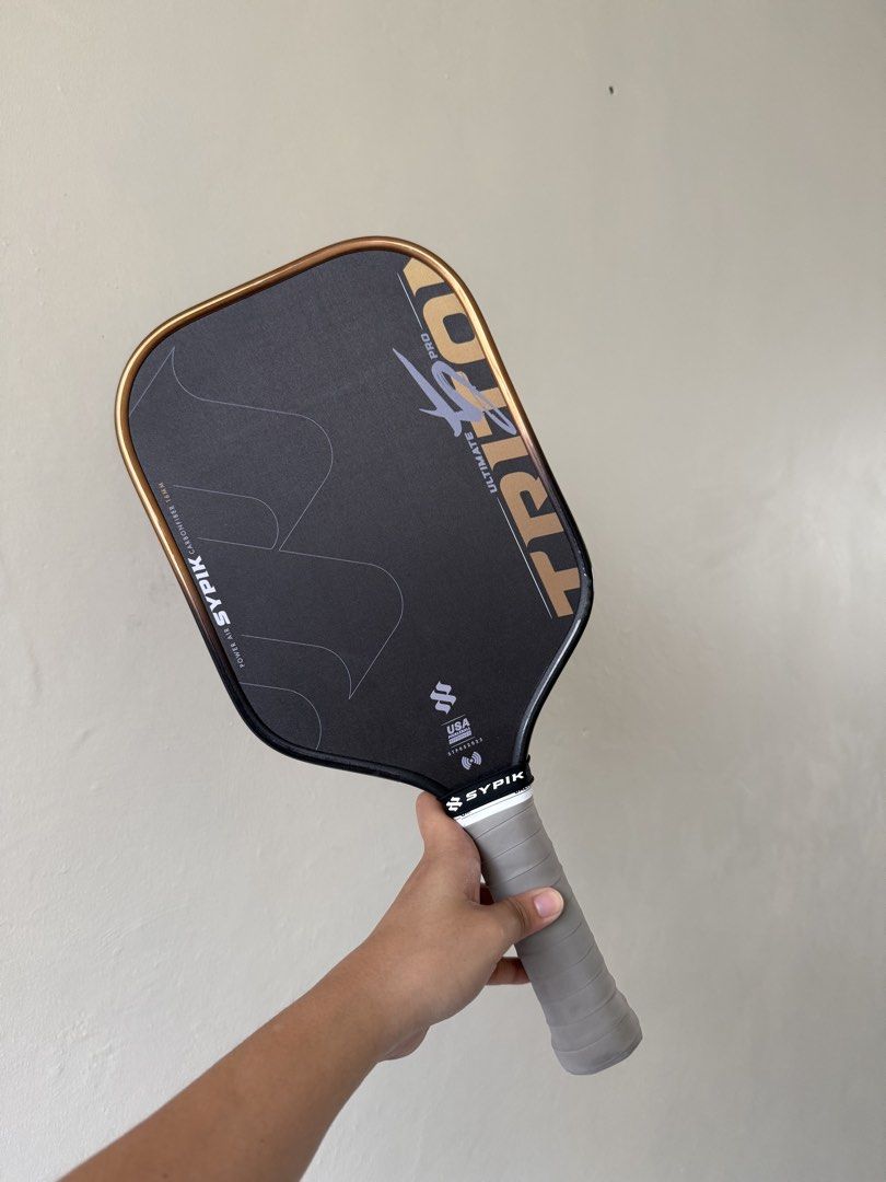 Sypik Triton 5 Ultimate Pro (Category: Racket and Ball Sports) located in Rizal. Submitted by jbddelacruz (Listing ID 1465319541, Image 2). Description: BRONZE HAZE NO ISSUES PRISTINE CONDITION 3 weeks old With ppf edge guard and over grip since day 1 Nfc scannable (warranty not yet activated).