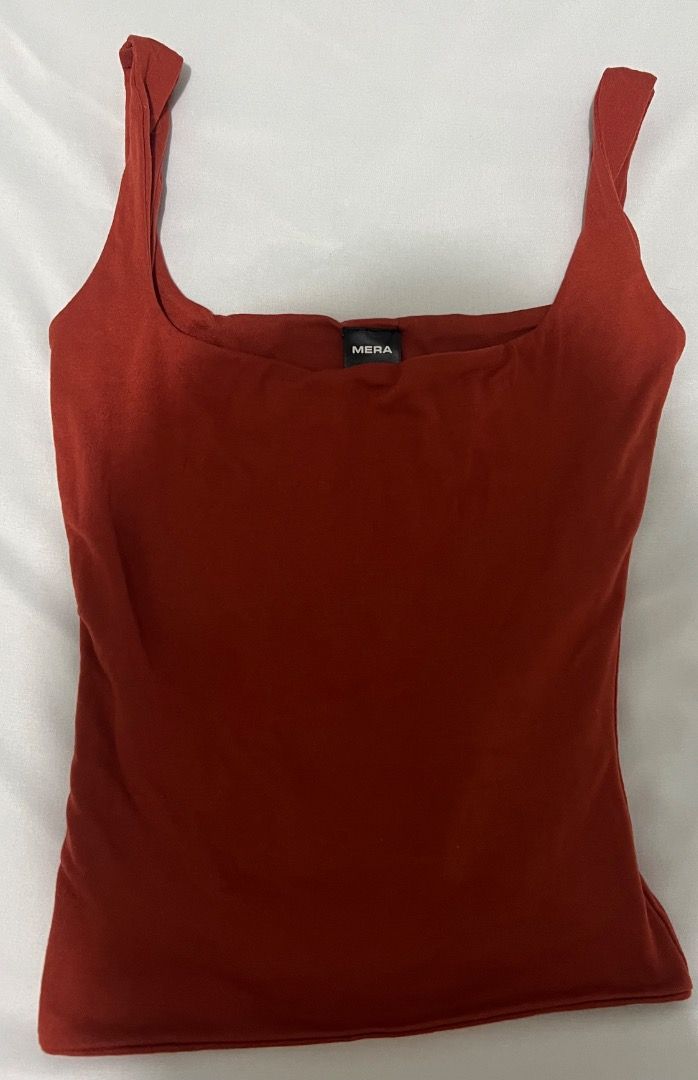 Tank Top (Category: Sleeveless) located in Cavite. Submitted by classicsale (Listing ID 1465213052, Image 1). Description: Mera Tank Top Good condition Size: XS Price: Php 70 only + shipping fee Payment: Gcash / Maya Shipping: LBC / Grab Express / J&T (dm for more options or details) DM FOR MORE INFO.
