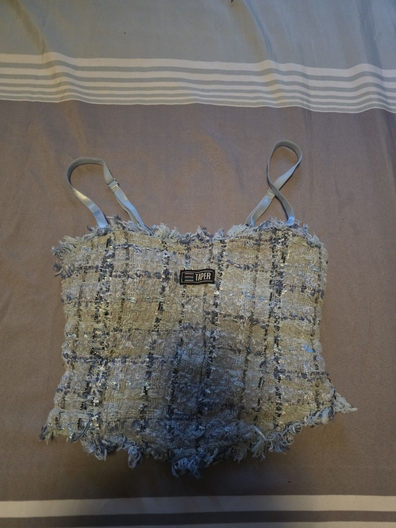 Taper Blue Tweed Crop Top with Straps (Category: Sleeveless) located in Manila. Submitted by cher0918 (Listing ID 1465261874, Image 1). Description: - Brand: Taper - Style: Light blue tweed crop top with a trendy checkered pattern - Details: Chic frayed edges throughout and brand label stitched near the center front - Straps: Adjustable thin shoulder straps for a custom fit - Lining: Smooth light blue inner lining for comfort.