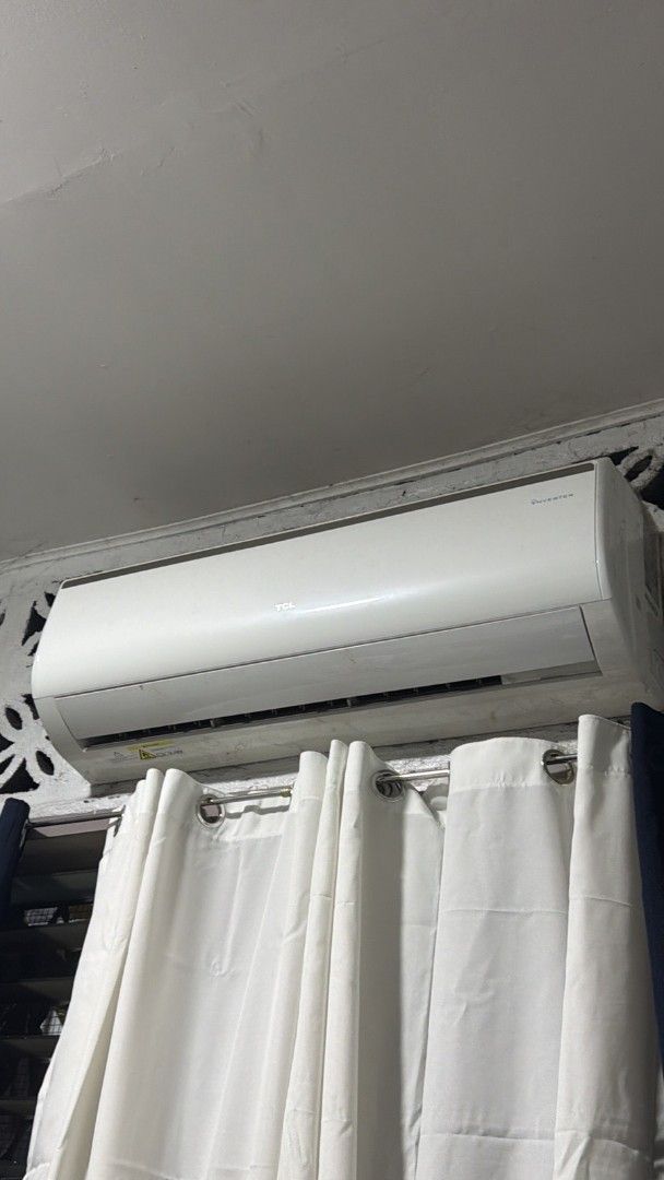 TCL Inverter Split Type Air Conditioner 2.5hp (Category: Air Conditioning and Heating) located in Caloocan City. Submitted by vic2489 (Listing ID 1465315798, Image 1). Description: - Brand/Model: TCL Wall-Mounted Inverter Aircon. - Color: Clean White - Condition: Used, recently removed from a bedroom - Performance: Cools fast and operates quietly - Features: Standard indoor unit size with built-in louvers and airflow controls - Ideal Use: Great a
