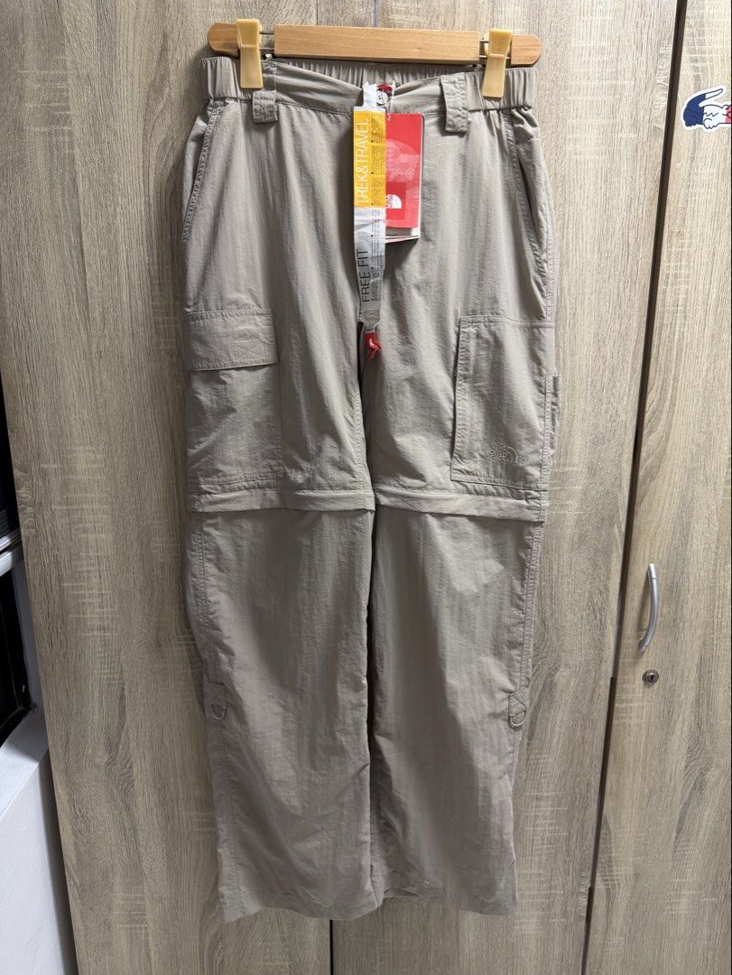 The North Face Convertible Hiking Pants (Category: Trousers) located in Imus. Submitted by rckrmns (Listing ID 1465341621, Image 1). Description: The North Face Convertible Hiking Pants -feature a lightweight, water repellent fabric with multiple utility pockets and a relaxed free fit design. Waist: 30-32 Length: 41 inch Leg opening: 9.5 Brand new with hangtags .