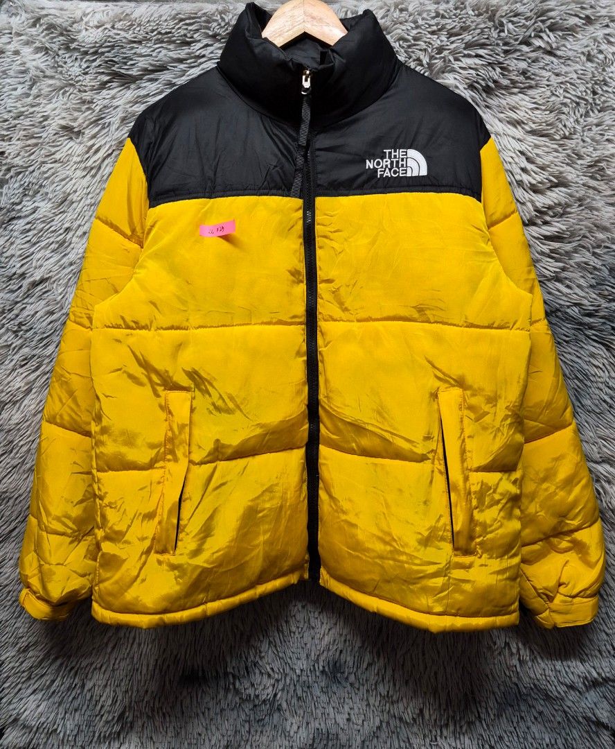 The North Face puffer jacket (Category: Coats, Jackets and Outerwear) located in Caloocan City. Submitted by jamestoledo30 (Listing ID 1465345899, Image 1). Description: Dimes LxW (in): 26 x 23 Condition : no issue Color Rate : 9.9/10 Like-new.