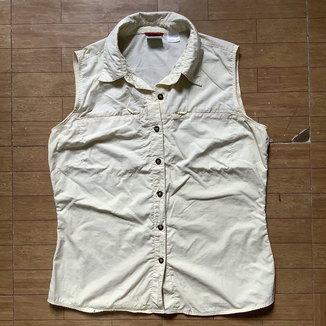 THE NORTH FACE yellow sleeveless top (Category: Sleeveless) located in Santa Rosa. Submitted by lilyestrell (Listing ID 1465175071, Image 1). Description: size: medium flaw: may parang flake sa 4th pic .