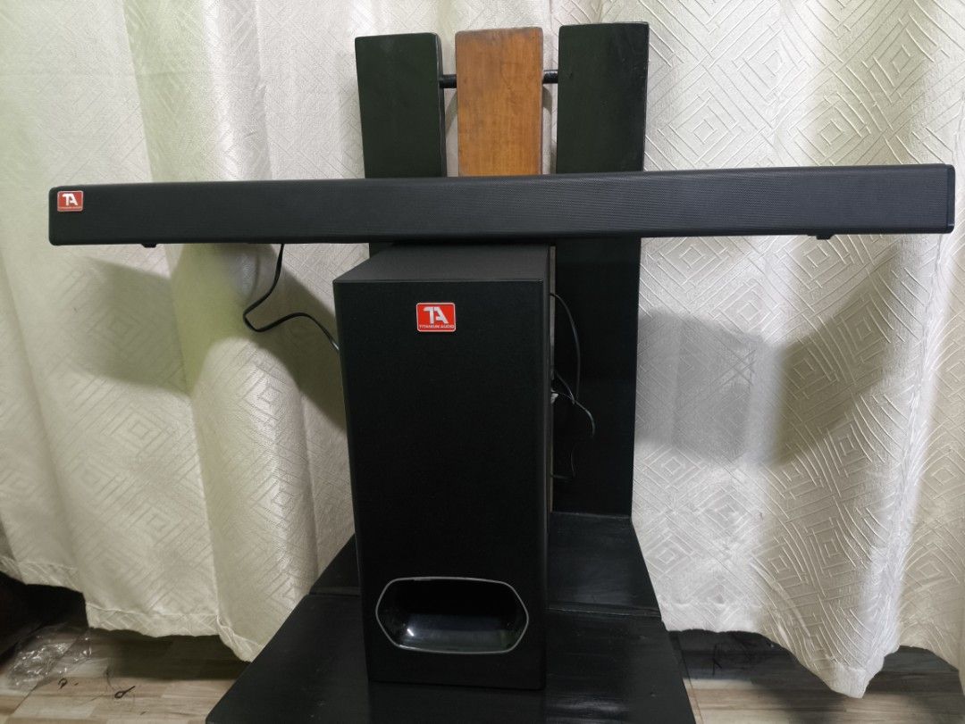 Titanium Audio Soundbar with Subwoofer Speaker System (Category: Soundbars, Speakers & Amplifiers) located in Manila. Submitted by jamilarag34702 (Listing ID 1465325988, Image 1). Description: 2.1 Channel Soundbar with Subwoofer 150watts Still presentable but have sign of usage butoverall no issue at all .
