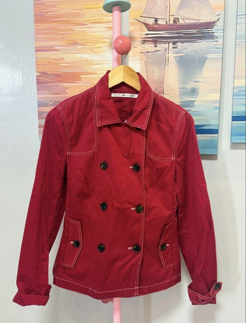 Tommy Hilfiger Red Double-Breasted Jacket Size M (Category: Coats, Jackets and Outerwear) located in Batangas. Submitted by melocollects (Listing ID 1465313634, Image 1). Description: - Brand: Tommy Hilfiger - Style: Double-breasted peacoat jacket - Color: Bright red with contrasting white topstitching - Details: Dark tortoiseshell buttons, classic collar, structured shoulders, and pocket flaps - Size: M - Condition: Great layering piece for cool