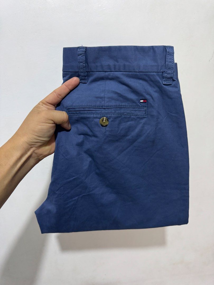 Tommy Hilfiger THFlex Blue Chino Pants (Category: Chinos) located in Manila. Submitted by esparciake75752 (Listing ID 1465280320, Image 1). Description: - Brand: Tommy Hilfiger (THFlex line) - Color: Dark Blue - Fit: Slim straight - Features: Standard front pockets, button-closure back pockets, belt loops, zipper fly, and THFlex branding tag - Condition: Great versatile option for work or weekend wear - Mode of payment: Gcash, Bank Transfer - Shi