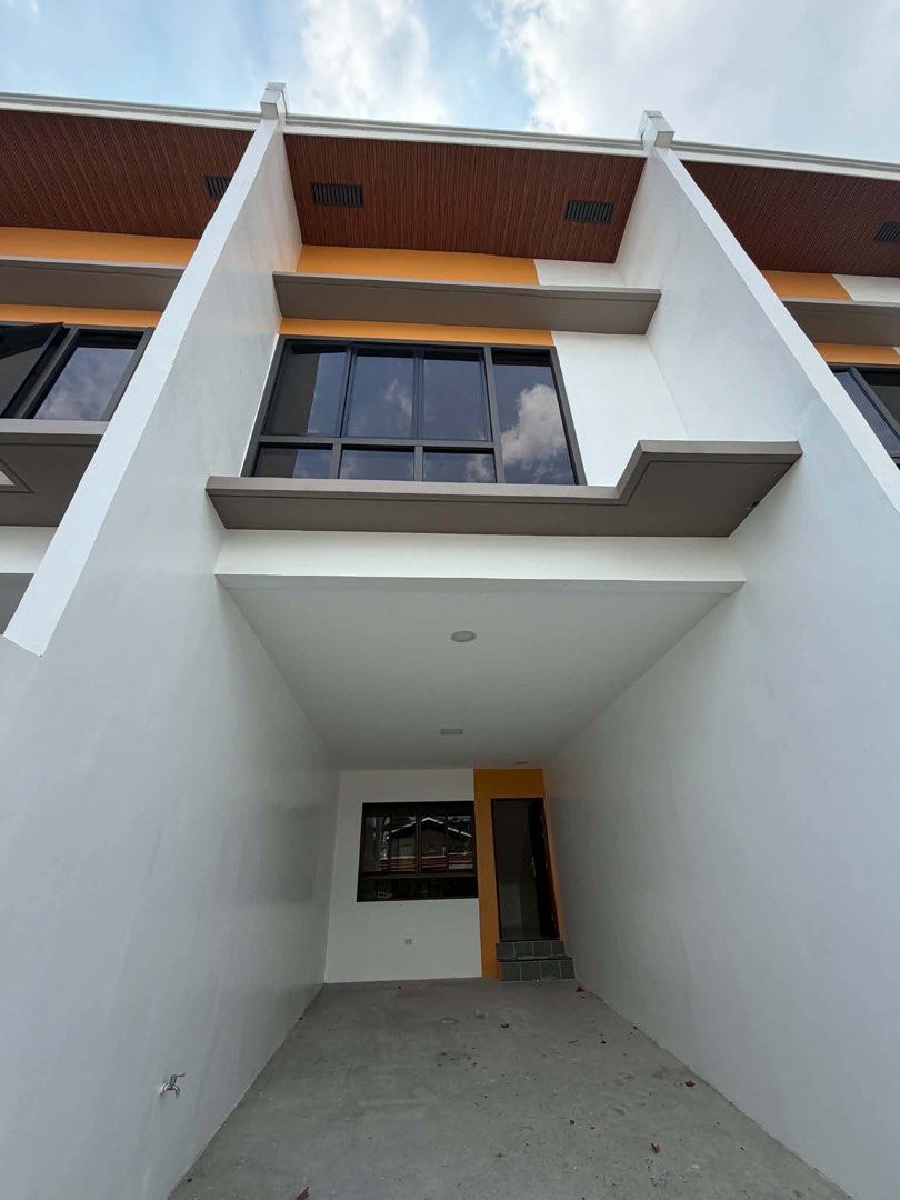 Townhomes Laspinas (Category: House & Lot) located in General Trias. Submitted by Myrna.09173055442 (Listing ID 1465214395, Image 2). Description: Triplex end RFO townhomes Laspinas 83sqm lot area 143.78sqm floor area Tcp 9,029,239 Res fee 50,000 Cashout 361,170 Upon NOA 311,170 Balance bank 20yrs monthly 58,952 Required income 197K #airmensvillage #pulanglupadoslaspinas #rfo #triplexendunit.