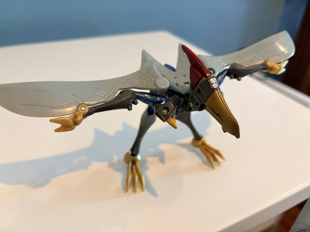 Transformers Animated Deluxe Class Swoop (2008) by Hasbro (Category: Action & Battle Toys) located in Santa Rosa. Submitted by serf60762 (Listing ID 1465242492, Image 2). Description: Selling Transformers Animated Swoop action figure (2008) by Hasbro for PhP 1.2K - Converts smoothly between robot and pteranodon modes - Classic blue and grey plastic with striking gold beak, claws, and feet - Joints hold poses securely for great shelf displays - In