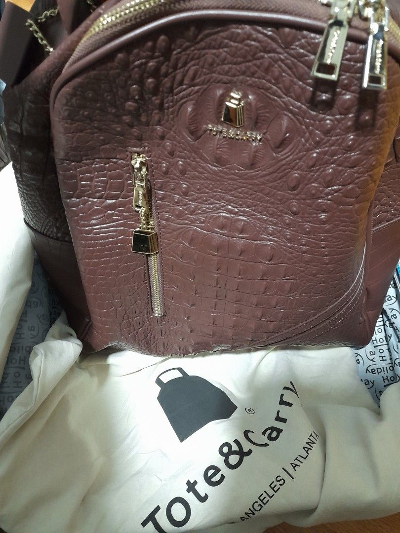 TRAVEL Set Tote and Carry LA Authentic (Category: Travel Essentials & Accessories) located in Cavite. Submitted by csdepot (Listing ID 1465260371, Image 3). Description: Tote & Carry Travel Set 2 pieces ( 1 backpack & 1 big bag) with Sling Large Sizes Color: Choco Brown See from Tote & Carry Website LA With Dust Bags Used only Twice in Europe Bought From LA Pristine condition Bought at $240 Original and authenti A lot better in actual Water repel