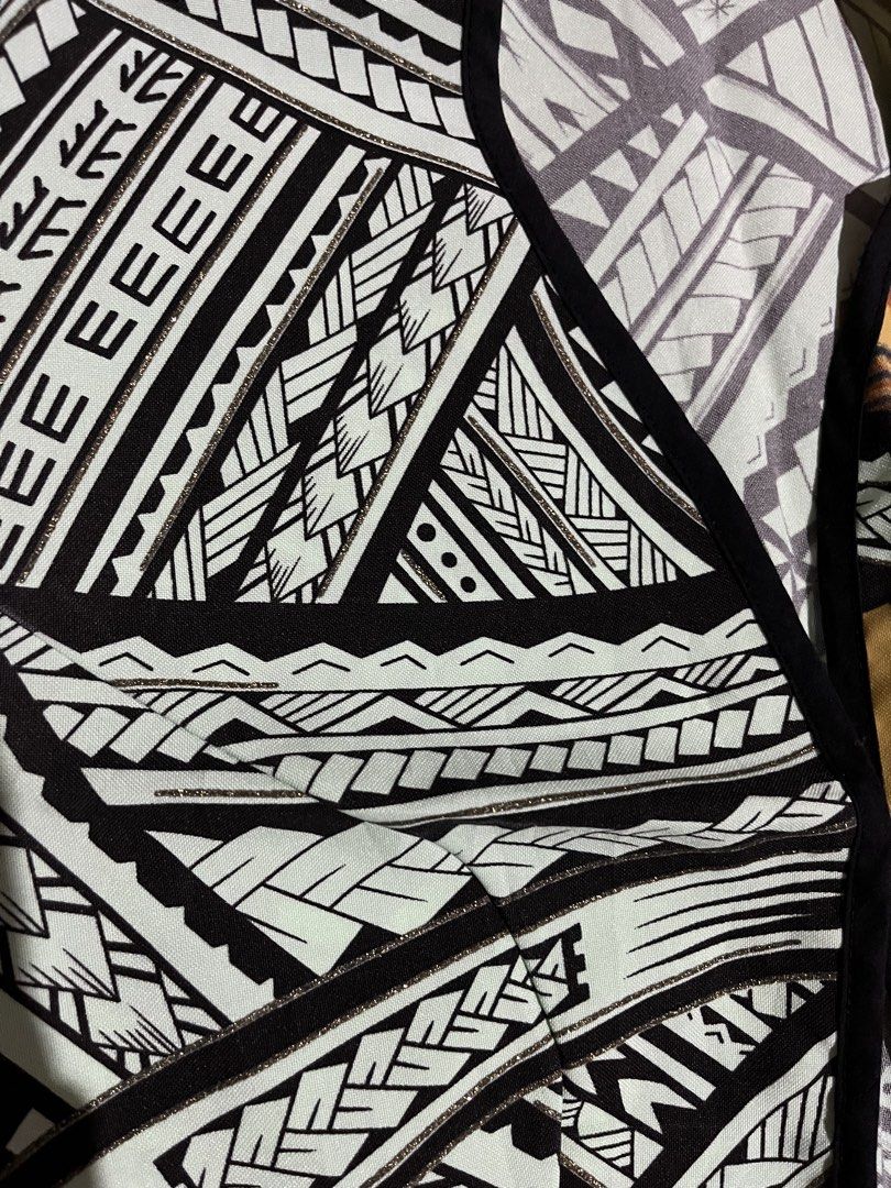 Tribal Print Open Front Crop Cardigan (Category: Coats, Jackets and Outerwear) located in Nagcarlan. Submitted by young_gfclira (Listing ID 1465173303, Image 2). Description: - Style: Short sleeve open-front cardigan - Pattern: Tribal and floral prints in black, white, and golden yellow - Details: Subtle metallic threading throughout with black piping trim on neckline, front, and hem - Material: Lightweight, unlined fabric - Condition: Great pre-