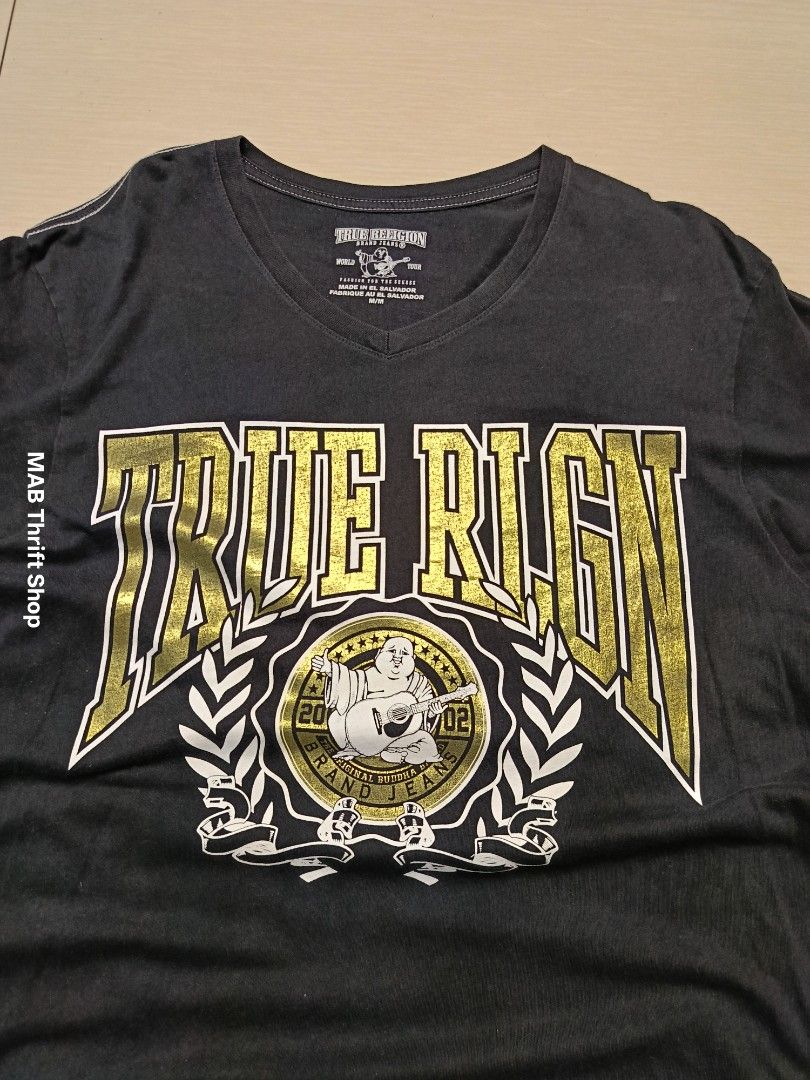 TRUE RELIGION GRAPHIC TEE (Category: Tshirts & Polo Shirts ) located in Kidapawan. Submitted by mabthriftshop (Listing ID 1465178842, Image 2). Description: Condition: Excellent Color rate: 9.8/10 Size: M Dimes: 20x27 Issue: None ⚠️ Buyer Notice: Please review all condition photos and size details carefully before purchasing to ensure a perfect fit. Ship Thru : J&T and LBC.