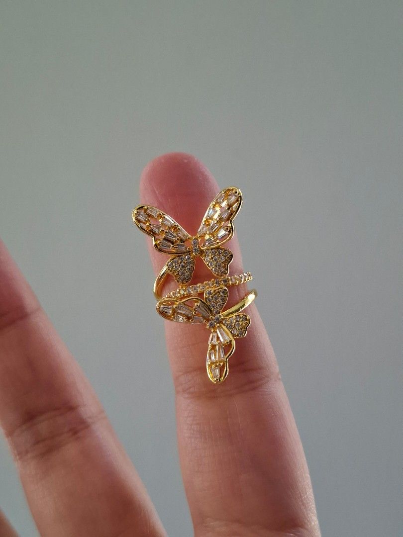 Twin Butterfly Designs Adjustable Gold Stainless Steel Ring (Category: Rings) located in Dasmarinas. Submitted by danabrie22 (Listing ID 1465214513, Image 3). Description: adjustable size 5 - 9 very well-made, excellent crafstmanship 10/10 condition brand new stainless steel & white-colored cubic zirconia stones made in Hongkong.