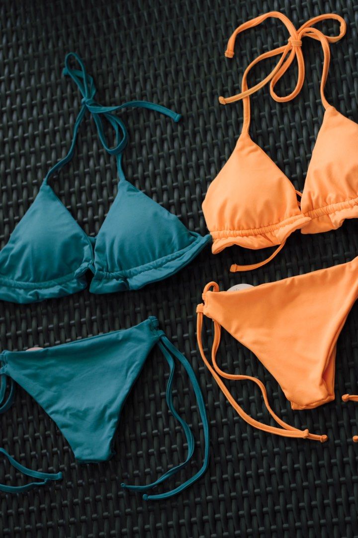 Two-Piece Halter Bikini Set in Assorted Colors (Category: Bikinis & Swimsuits) located in Las Pinas. Submitted by seeyuhhh (Listing ID 1465209216, Image 1). Description: - 3 vibrant colors available: Teal, Orange, and Light Pink - Style: Two-piece bikini with adjustable halter neck and side-tie bottoms - Design: Cute ruffle details along the triangle cups - Material: Stretchy, comfortable fabric ideal for swimming and lounging - Purchase options: