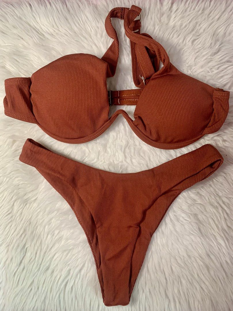Two-Piece Swimsuit/Bikini Set (Category: Bikinis & Swimsuits) located in Muntinlupa City. Submitted by .jieunbean (Listing ID 1465203054, Image 1). Description: - Color: Rust orange - Good Condition - used only once - best fit for petite size (xs-s) - no photo when worn 🙇‍♀️ rfs: declutter dm for details.