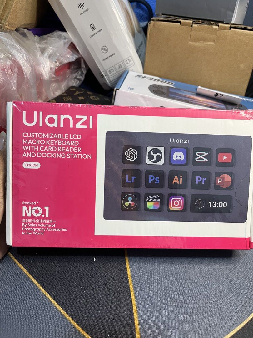 Ulanzi D200H Customizable LCD Macro Keyboard Docking Station (Category: Computer Keyboard) located in Manila. Submitted by abbigail029. (Listing ID 1465199982, Image 1). Description: - Brand new, factory-boxed Ulanzi D200H macro keyboard - Features 14 customizable, colorful LCD keys - Built-in 7-in-1 docking station with card reader - Ports: USB-C 3.0 Gen 1 (PD 100W), 2x USB-C 3.0, 2x USB-A 3.0, SD & TF card slots - Input: 5V 2A - Includes Type-C