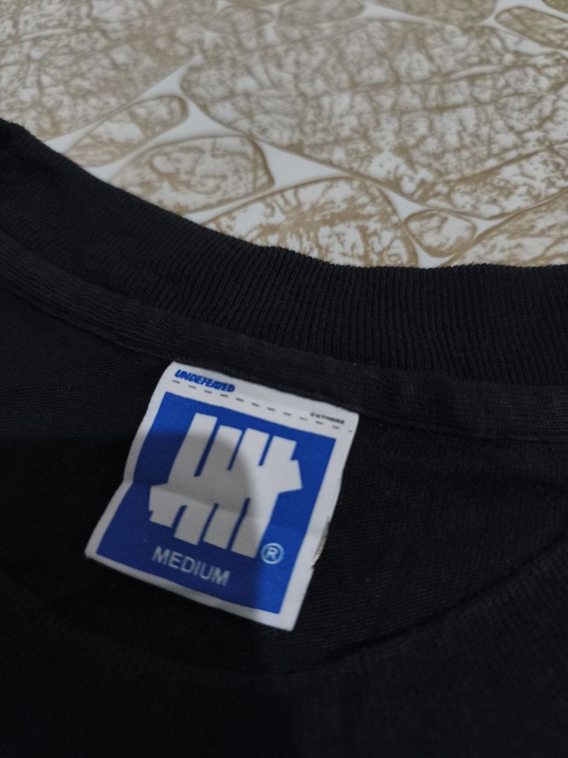 UNDEFEATED (Category: Tshirts & Polo Shirts ) located in Cebu City. Submitted by chrismark.cavan11 (Listing ID 1465173164, Image 3). Description: - UNDEFEATED - Size Medium - Color rate 9.8 / 10 - Excellent condition - Plus SF.