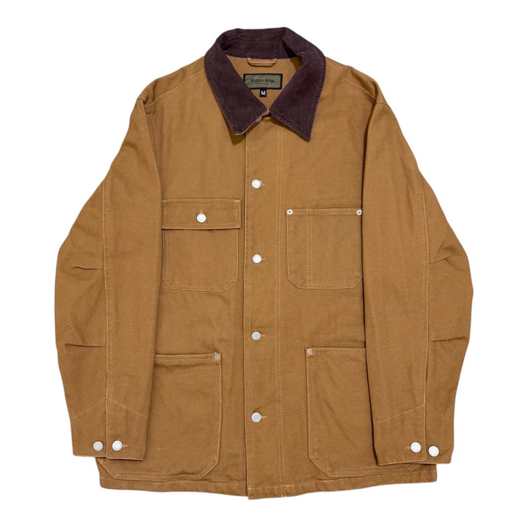 Uniform Bridge Brown Oxford Coverall Chore Jacket (Category: Coats, Jackets and Outerwear) located in Dinalupihan. Submitted by brokencasket (Listing ID 1465275063, Image 1). Description: Uniform Bridge Brown Oxford Coverall Chore Jacket Size M on tag. Measurements on photo. Model Height 5’8 .