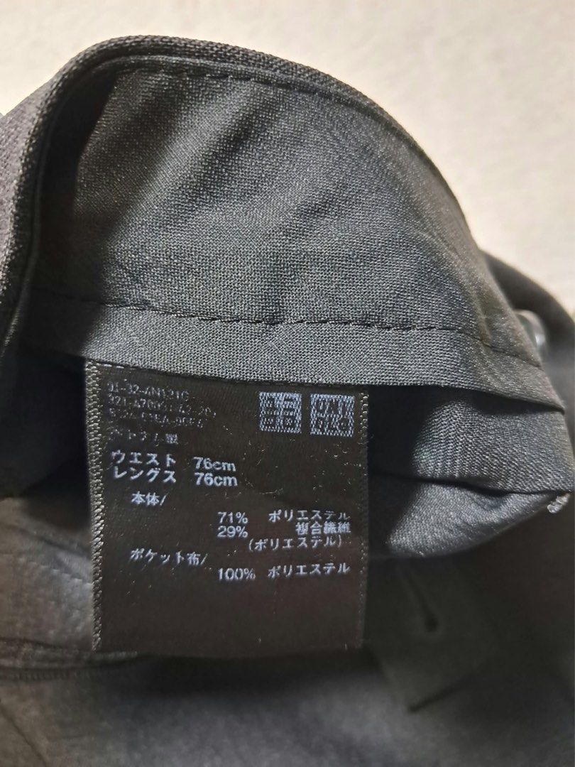 Uniqlo Dark Grey Kando Pants 76cm (Category: Trousers) located in Baguio. Submitted by padisellsz (Listing ID 1465252489, Image 2). Description: - Brand: Uniqlo - Very good condition - Color: Dark grey - may gasgas yung sa likod na sintereras (suotan ng sinturon) - Style: Clean tailored dress pants with belt loops, front button, and zip fly closure - Material: 71% polyester, 29% composite fiber - Measurements (laid flat): Waist 30 inches, Inseam 