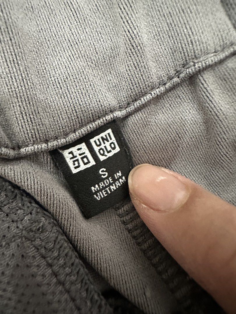 Uniqlo Grey Polyester Trousers Pants Size S (Category: Trousers) located in Quezon City. Submitted by crslph (Listing ID 1465303993, Image 3). Description: - Brand: Uniqlo - Material: 100% polyester (clean fabric, no flaws) - Feature: Zipper pocket detail on the back - Style: Versatile everyday pants, great for casual wear or office days.