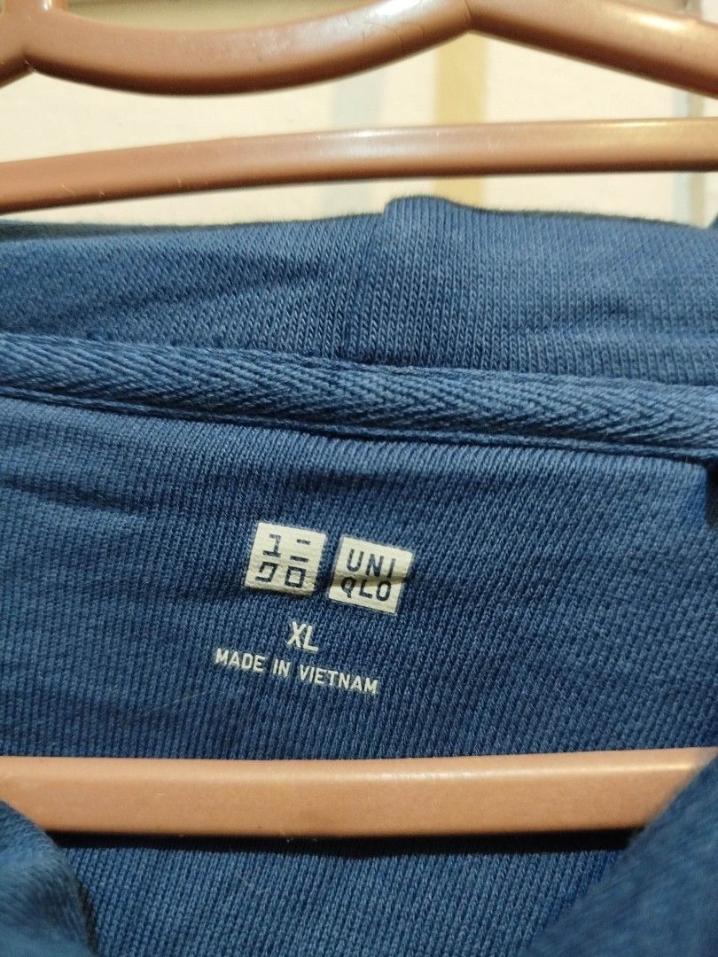 Uniqlo Jacket (Category: Coats, Jackets and Outerwear) located in Las Pinas. Submitted by wisedragon-84af (Listing ID 1465308689, Image 2). Description: Blue Hooded Uniqlo Jacket with two side Pockets.