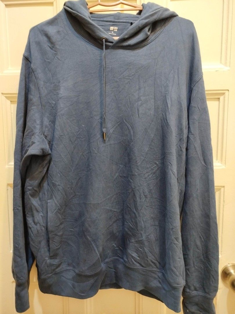 Uniqlo Jacket (Category: Coats, Jackets and Outerwear) located in Las Pinas. Submitted by wisedragon-84af (Listing ID 1465308689, Image 1). Description: Blue Hooded Uniqlo Jacket with two side Pockets.