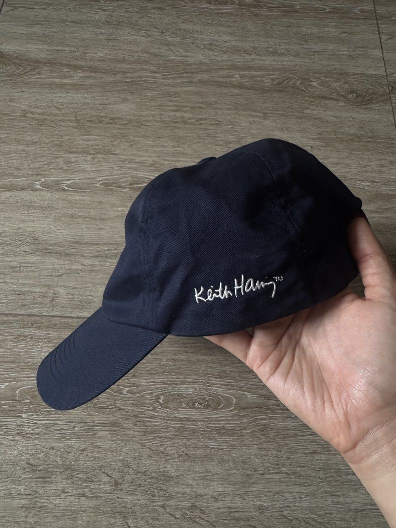 UNIQLO Keith Haring Navy Blue Cap (Category: Caps & Hats) located in Quezon City. Submitted by thshxn21 (Listing ID 1465190901, Image 2). Description: **bought for 990 SHIPPING & PAYMENT * Delivery: Lalamove only (Buyer shoulders the shipping fee) * Payment via GCash / Bank Transfer PLEASE READ BEFORE BUYING * Pre-loved/Used unless stated otherwise. Please manage your expectations * Colors may slightly vary due to lighting during photography * No