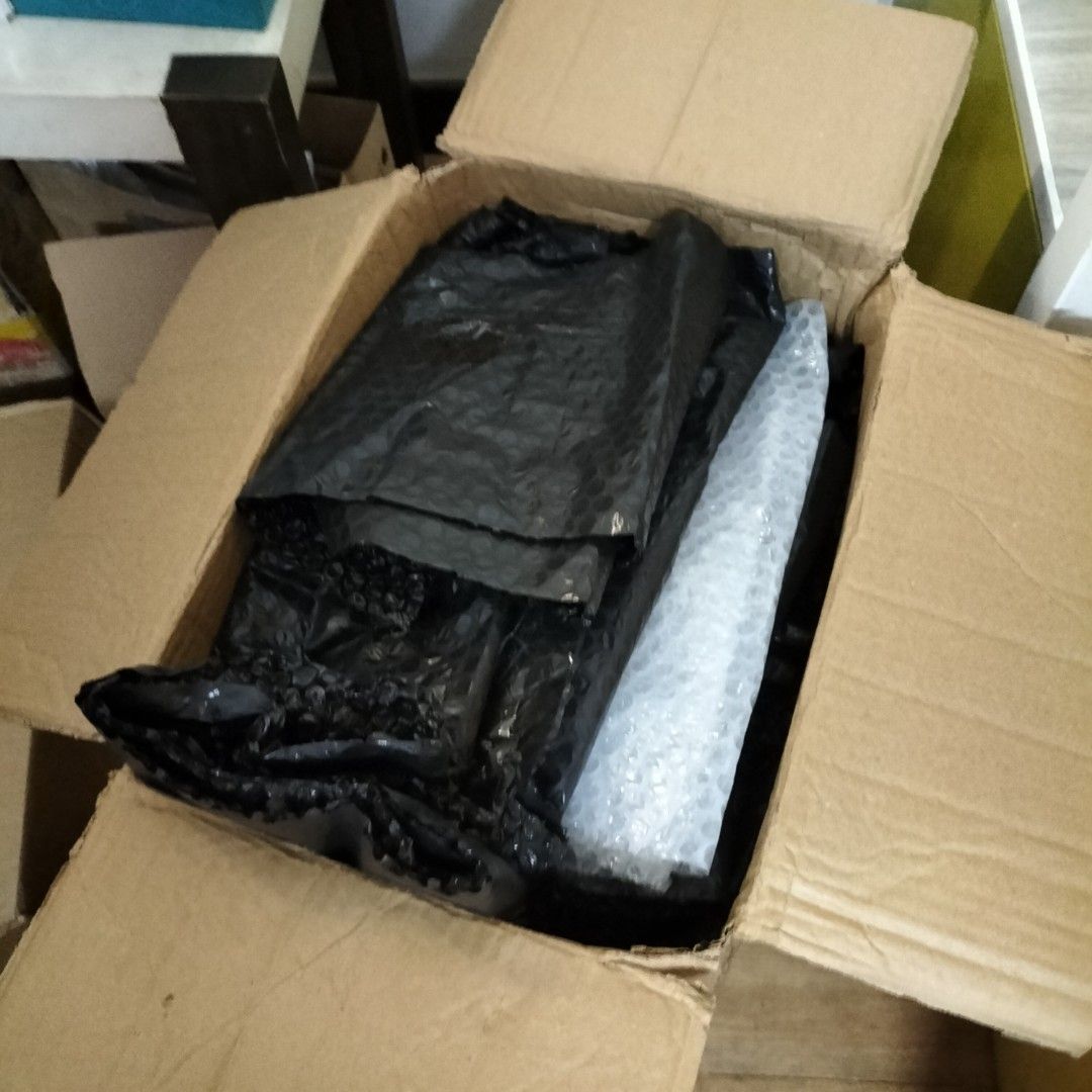 used boxes and bubble wrap (Category: Storage Boxes & Baskets) located in Paranaque City. Submitted by decluttering-all (Listing ID 1461609061, Image 1). Description: - used boxes and bubble wrap - clean decluttering pick up beside Toyota bicutan paranaque .