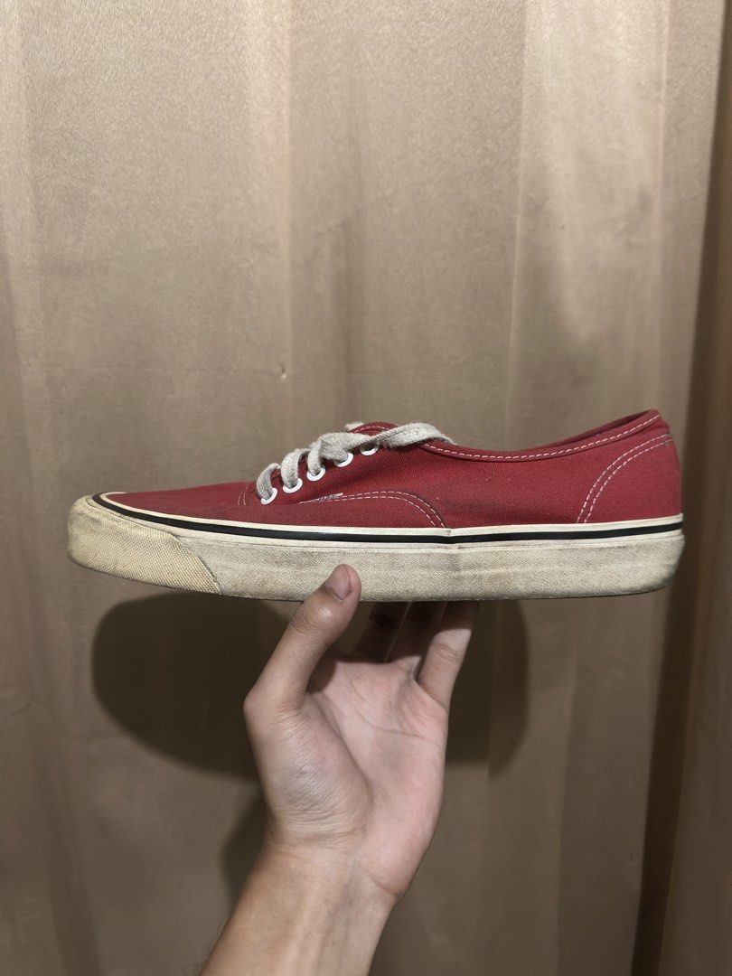 Vans Authentic Red Low-Top Sneakers (Category: Sneakers) located in Quezon City. Submitted by bebe0827 (Listing ID 1465300891, Image 3). Description: - Brand: Vans Authentic - Color: Red canvas - Style: Classic low-top skater design - Details: White laces and metal eyelets - Condition: Clean uppers, with normal dirt and wear on the waffle rubber midsoles - Sizing: Standard sizing.