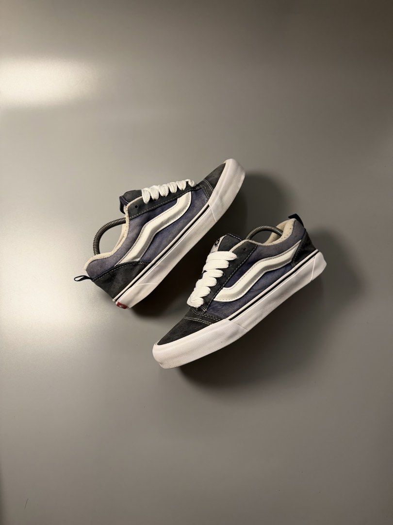 Vans KNU Old Skool Blue White Sneakers (Category: Sneakers) located in Caloocan City. Submitted by maempenafi21452 (Listing ID 1465282879, Image 1). Description: - Brand: Vans Old Skool - Color: Navy Blue and White - Size: Men's US 10.0 - Material: Suede and canvas upper with standard waffle rubber outsole - Features: Iconic side stripe, chunky white laces, padded ankle collar, and rear pull tab - Style: Classic skate shoes.