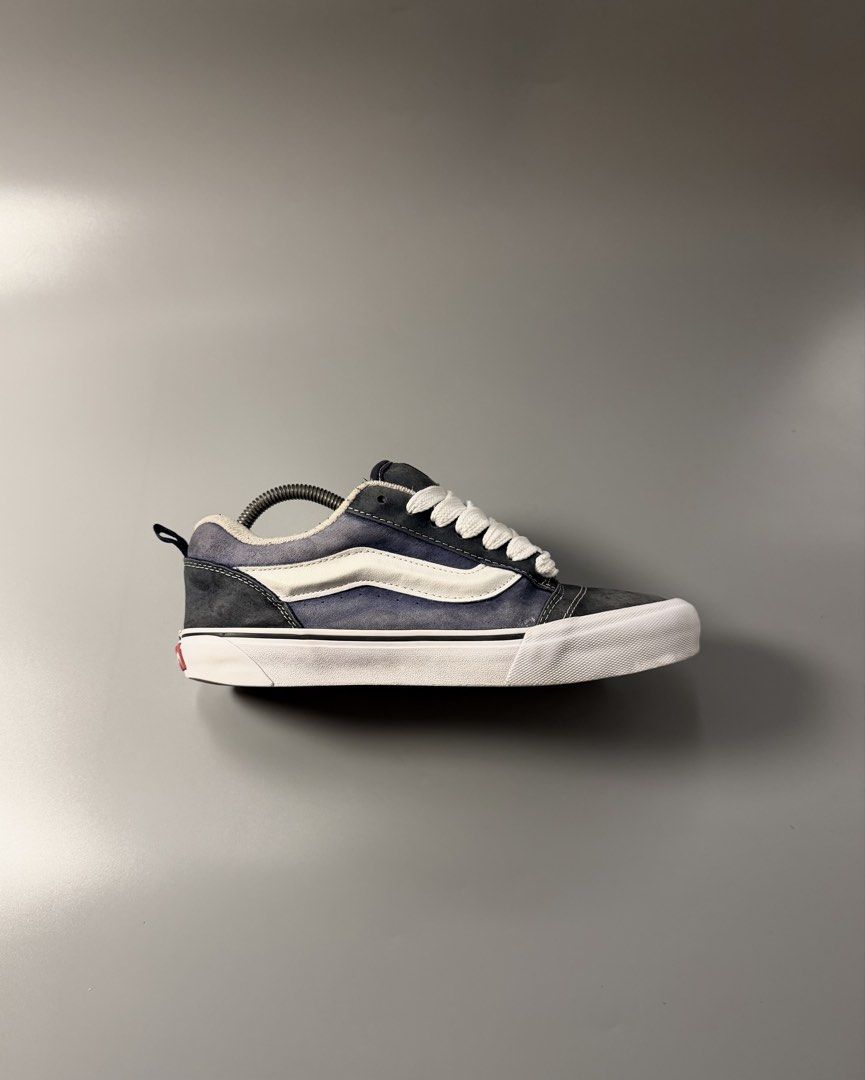 Vans KNU Old Skool Blue White Sneakers (Category: Sneakers) located in Caloocan City. Submitted by maempenafi21452 (Listing ID 1465282879, Image 2). Description: - Brand: Vans Old Skool - Color: Navy Blue and White - Size: Men's US 10.0 - Material: Suede and canvas upper with standard waffle rubber outsole - Features: Iconic side stripe, chunky white laces, padded ankle collar, and rear pull tab - Style: Classic skate shoes.