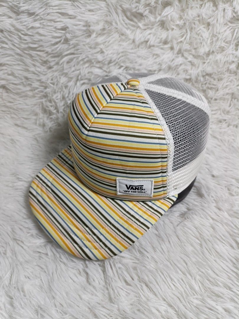 Vans Striped Trucker Snapback Cap Hat (Category: Caps & Hats) located in Imus. Submitted by grindhouse.thriftshop (Listing ID 1465240497, Image 2). Description: - Brand: Vans - Style: Trucker cap with colorful horizontal stripes - Back: White mesh panels with adjustable snapback closure - Details: White 'Off The Wall' patch on the front crown - Brim: Flat brim matching the striped pattern - Condition: Clean interior and crisp exterior.