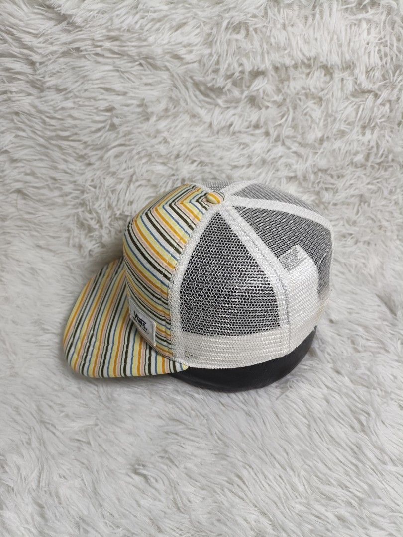 Vans Striped Trucker Snapback Cap Hat (Category: Caps & Hats) located in Imus. Submitted by grindhouse.thriftshop (Listing ID 1465240497, Image 3). Description: - Brand: Vans - Style: Trucker cap with colorful horizontal stripes - Back: White mesh panels with adjustable snapback closure - Details: White 'Off The Wall' patch on the front crown - Brim: Flat brim matching the striped pattern - Condition: Clean interior and crisp exterior.