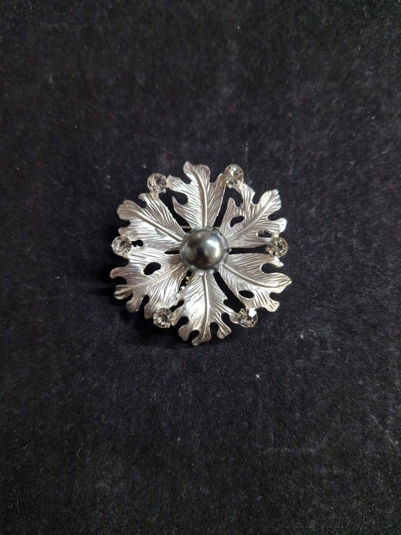 Vibrant Bloom Brooch 2 (Category: Brooches) located in Taguig. Submitted by mommaschoice (Listing ID 1465340580, Image 1). Description: Brand New Silver-Tone finish Adorned w/ faux pearl and rhinestones Adds elegance to one's outfit Ships nationwide.