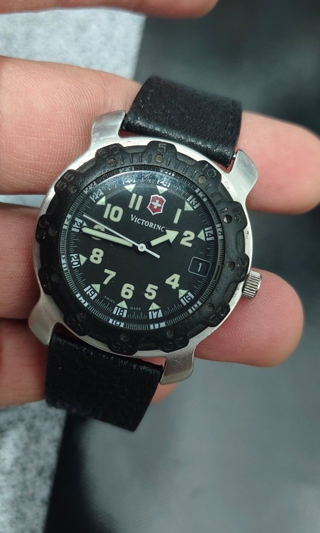 Victorinox Swiss Army (Category: Men's Watches) located in Cebu City. Submitted by aceoftime (Listing ID 1465362434, Image 2). Description: In good working condition Swiss Made Swiss analog quartz with date display Unidirectional rotating bezel Fitted with black leather band Watch only Our Guarantee: 💯 Authentic All watches are checked by our experienced technician to ensure good functionality Please manage your expectations since these are prel