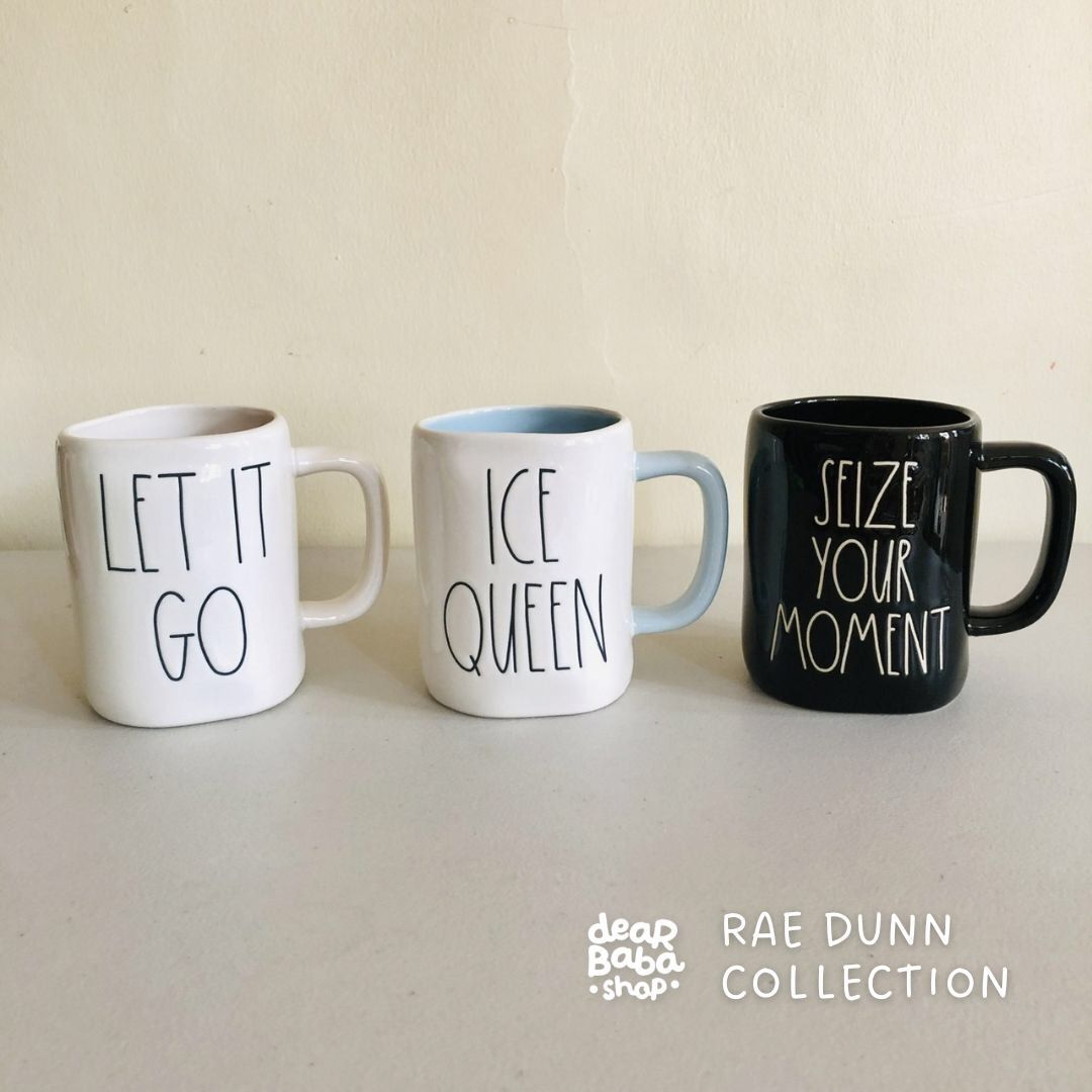 VII. RAE DUN x Disney Collection Mugs (Category: Coffee & Tea Tableware) located in Imus. Submitted by dyelinn (Listing ID 1465252607, Image 1). Description: 𝐍𝐄𝐖 𝐀𝐑𝐑𝐈𝐕𝐀𝐋 💫 DISNEY Rae Dunn by Magenta Artisan Collection ~ 500mL ceramic mug ~ may get hot in microwave; dishwasher safe ~ authentic with logo 🌟Rare, front and back designs ₱550 LET IT GO (Frozen, Elsa) ICE QUEEN (Frozen, Elsa) SEIZE YOUR MOMENT (Coco).