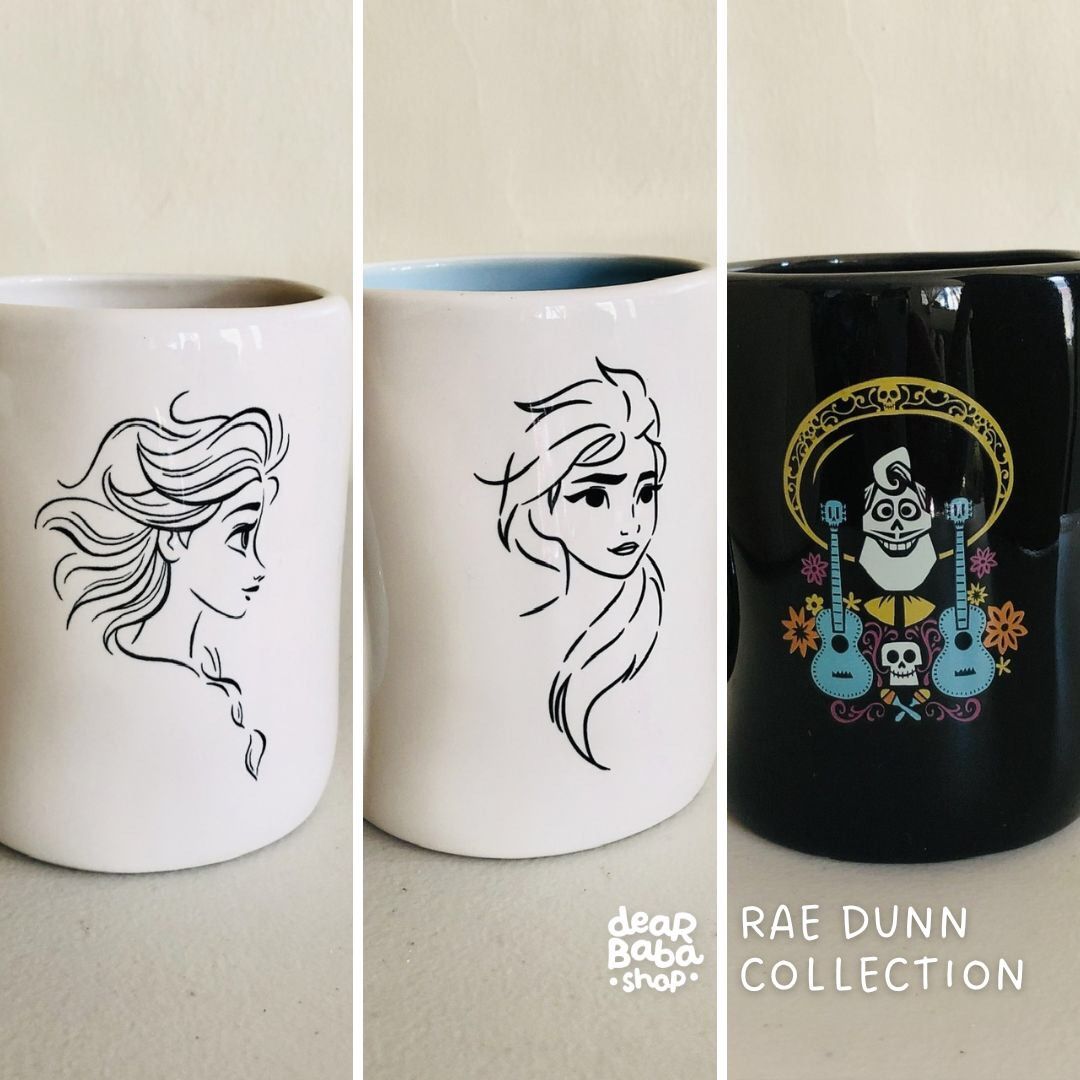 VII. RAE DUN x Disney Collection Mugs (Category: Coffee & Tea Tableware) located in Imus. Submitted by dyelinn (Listing ID 1465252607, Image 2). Description: 𝐍𝐄𝐖 𝐀𝐑𝐑𝐈𝐕𝐀𝐋 💫 DISNEY Rae Dunn by Magenta Artisan Collection ~ 500mL ceramic mug ~ may get hot in microwave; dishwasher safe ~ authentic with logo 🌟Rare, front and back designs ₱550 LET IT GO (Frozen, Elsa) ICE QUEEN (Frozen, Elsa) SEIZE YOUR MOMENT (Coco).