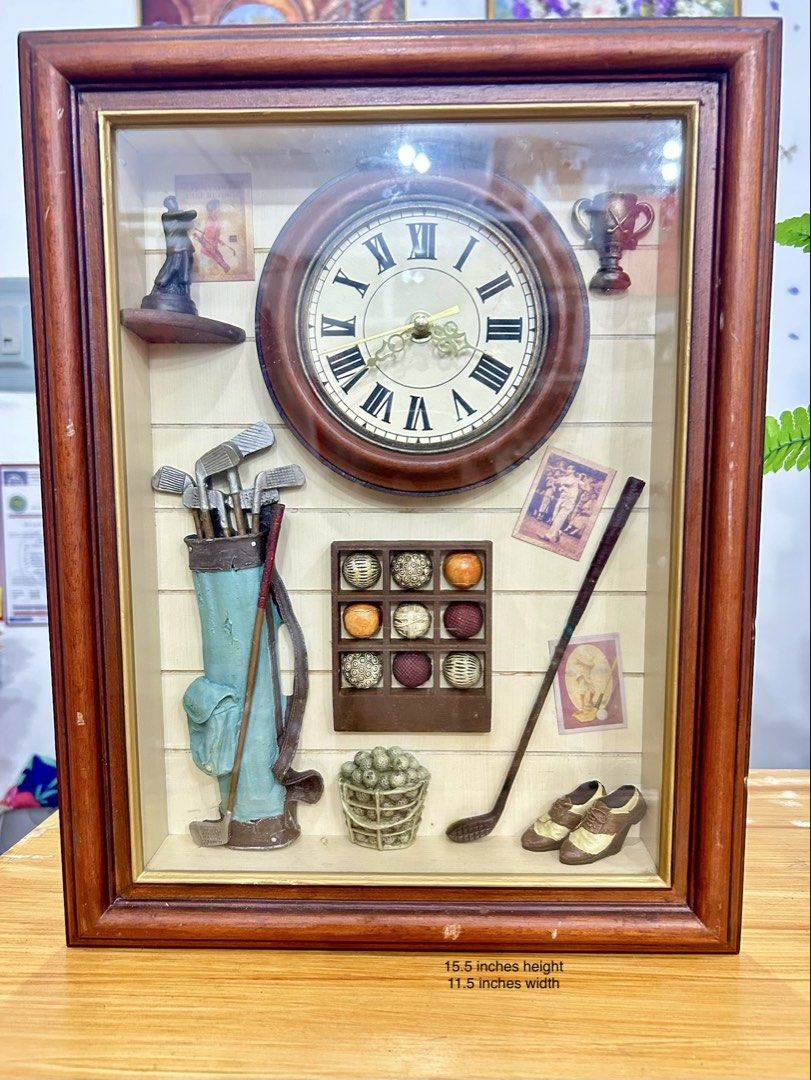 Vintage 3D Golf Shadow Box Wall Clock! (Category: Vintage Collectibles) located in Bustos. Submitted by gthings.collectibles (Listing ID 1465290376, Image 1). Description: Looking for the perfect piece para sa inyong man cave, office, o library? ⛳️🕰️ Yours at ₱1800 only !! For sale: Vintage 3D Golf Shadow Box Wall Clock! • Classic & Nostalgic Design: May detailed mini teal golf bag, vintage-patterned balls, miniature shoes, at historical golfer 