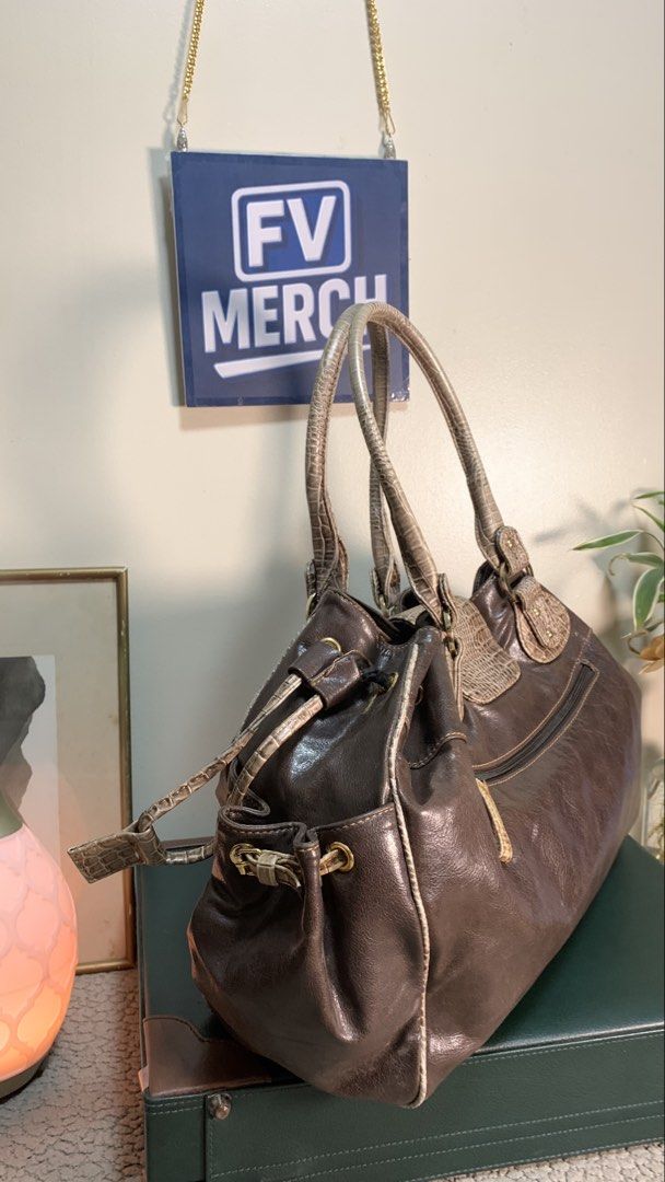 vintage AK Anne Klein | brown leather (Category: Shoulder Bags) located in Mandaluyong City. Submitted by fv_merch (Listing ID 1465273764, Image 2). Description: ₱ 1250 vintage AK Anne Klein | brown leather satchel shoulder bag; gold-tone signature hardware plaque. Issues: Minor Sign of Usage; More photos in comment section. ⚠ DISCLAIMER: All brand names, logos, and trademarks belong to their respective owners and are used for identification/auth