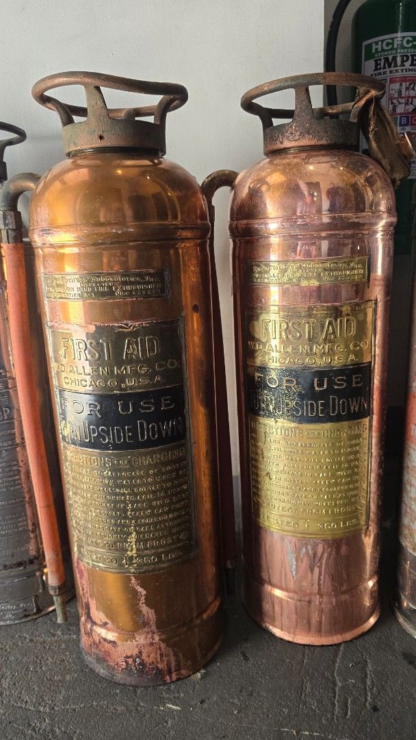 Vintage Copper and Chrome Fire Extinguishers Collection (Category: Vintage Collectibles) located in Las Pinas. Submitted by raquelfran06087 (Listing ID 1465304702, Image 1). Description: - Vintage fire extinguishers for sale, featuring classic copper and chrome models - Includes trusted brands like First Aid, Red Star, and Badger - Designed with heavy brass-like top handles and authentic metal bodies - Retains original stamped operating instructi