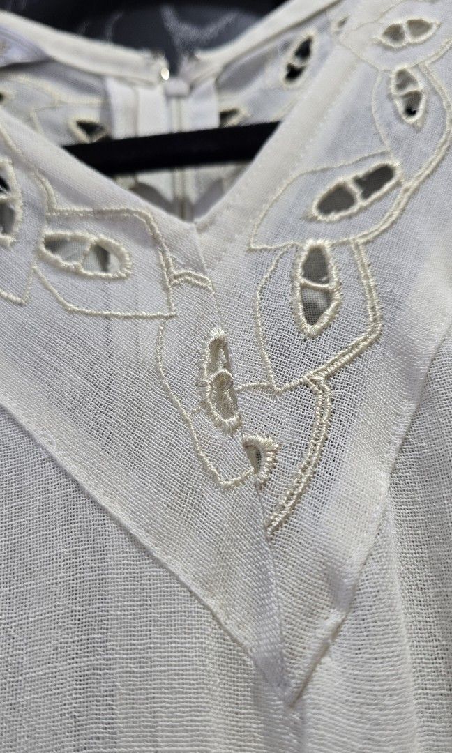 Vintage Cream Dress (Category: Dresses) located in Makati City. Submitted by lolachicph (Listing ID 1465235382, Image 3). Description: MEASUREMENTS (inches) Length: 41 laid flat Waist: 24-28 elastic Chest: 15 laid flat armpit to armpit Shipping: GRAB/LALA/ANGKAS booked and paid for by the buyer. Location: Legaspi Village Makati -Color: Cream - Style: Sleeveless V-neck midi dress with eyelet embroidery. With lining on skirt, no lining on top. - Fi