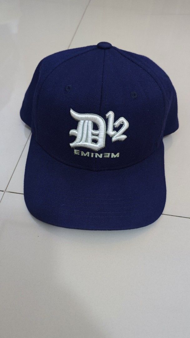 Vintage eminem cap wool (Category: Caps & Hats) located in Davao. Submitted by jhinkertzp55934 (Listing ID 1465186943, Image 1). Description: vintage cap with D12 and Eminem embroidered on the front. Matching D12 logo embroidery on the back strap. Adjustable Velcro closure in the back. Made in Korea, 80% acrylic and 20% wool blend. Clean interior tag..