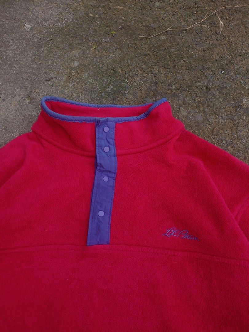 Vintage L.L. Bean Red Fleece Snap-Neck Pullover (Category: Coats, Jackets and Outerwear) located in Caloocan City. Submitted by reymartthrift (Listing ID 1465253572, Image 3). Description: Dimes 19x24 Kids size Medium adult size Small fit to medium No issue brand new condition Brand: L.L. Bean - Color: Bright red with stylish purple trim - Design: Snap-neck front placket with four snaps - Material: Soft, cozy.